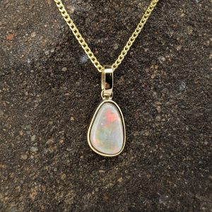 Solid White Opal 9K Yellow Gold Pendant