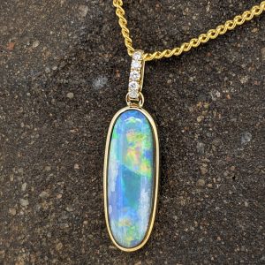 Solid Black Opal 9K Yellow Gold Pendant With Diamonds