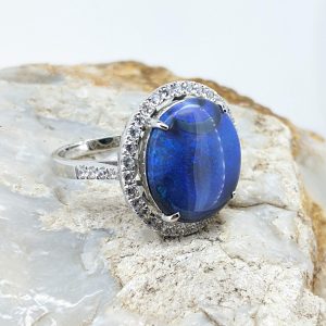 Solid Black Opal Sterling Silver Ring With Halo Setting