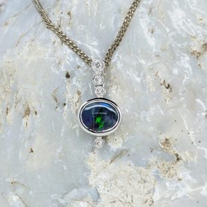 Solid Black Opal 18K White Gold Pendant With Diamonds
