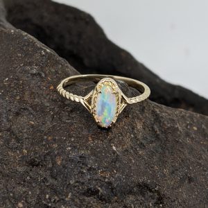 Solid White Opal 9K Yellow Gold Ring