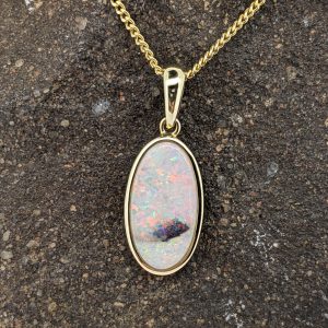 Solid White Opal 9K Yellow Gold Pendant