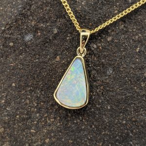 Solid White Opal 9K Yellow Gold Pendant