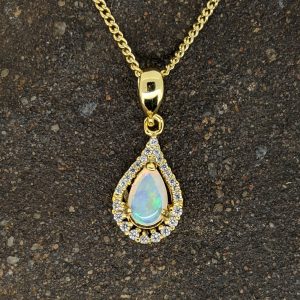 Solid White Opal Gold-Plated Sterling Silver Pendant With Cubic Zirconias
