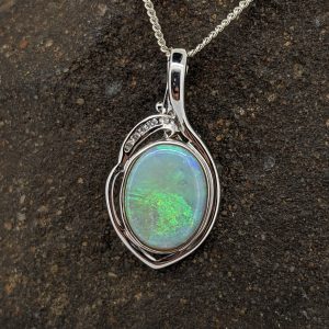 Solid White Opal 14K White Gold Pendant With Enhancer And Diamonds