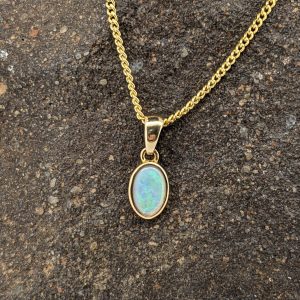 Solid White Opal 9K Yellow Gold Pendant