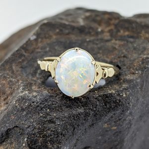 Solid White Opal 9K Yellow Gold Ring