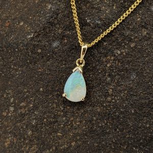 Solid White Opal 9K Yellow Gold Pendant