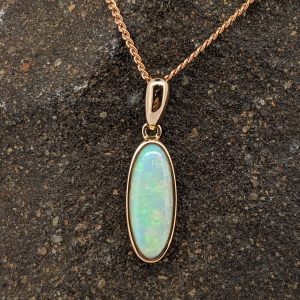 Solid White Opal 9K Rose Gold Pendant
