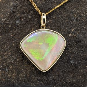 Solid White Opal 9K Yellow Gold Pendant