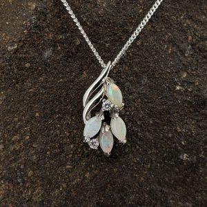Solid White Opal Sterling Silver Pendant With Cubic Zirconias