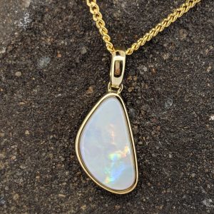 Solid White Opal 9K Yellow Gold Pendant