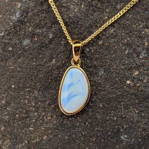 Solid White Opal 9K Yellow Gold Pendant